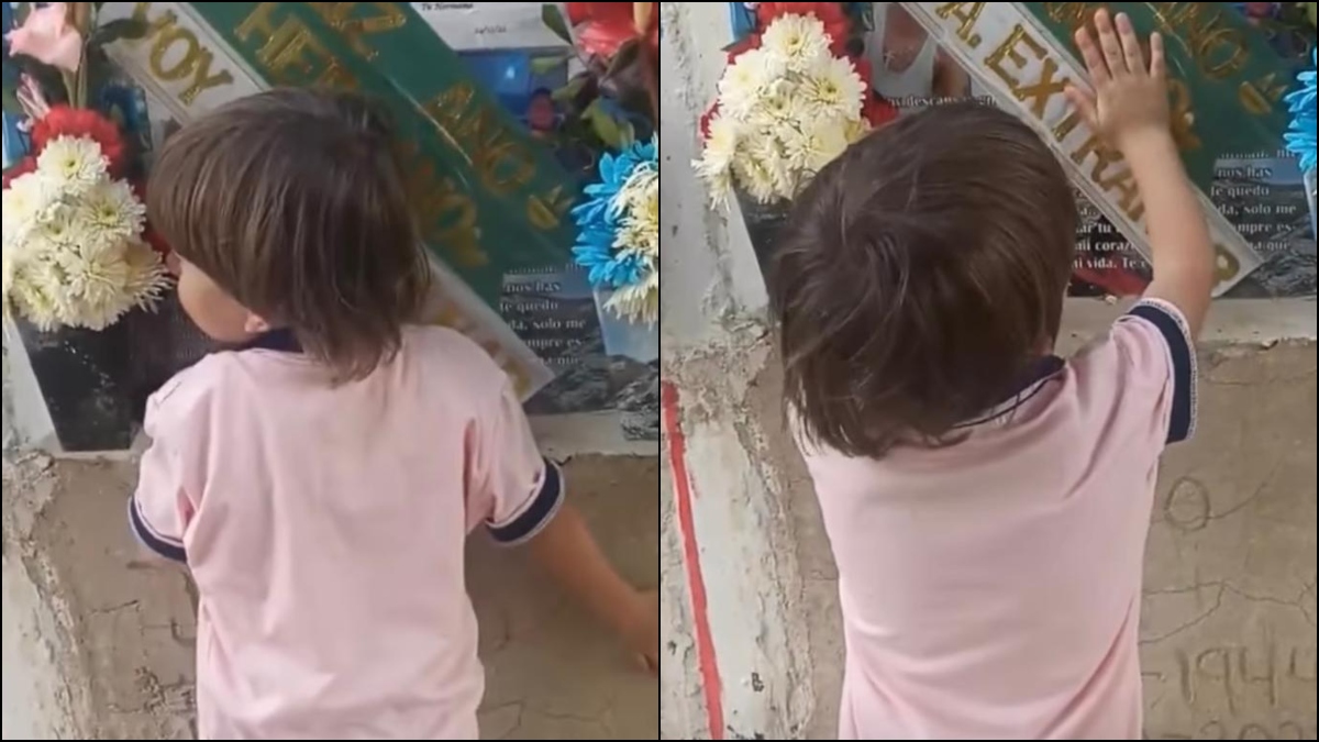 Niño visita la tumba de su padre