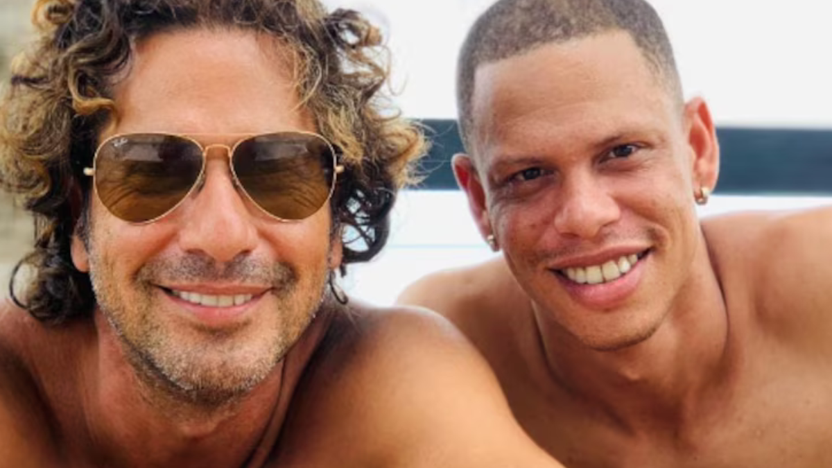 Gregorio sonriendo junto a su hijo. Crédito: @diego_pernia2314