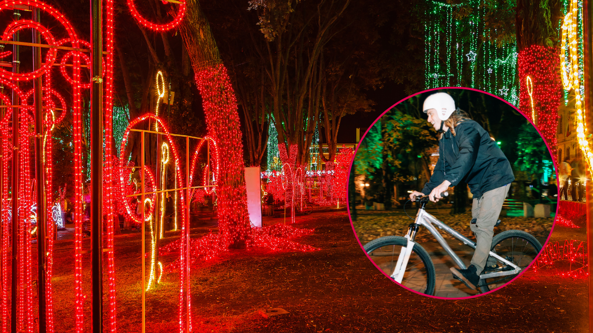 Ciclista emocionado en alumbrado de Bogotá. | Crédito. Getty images.